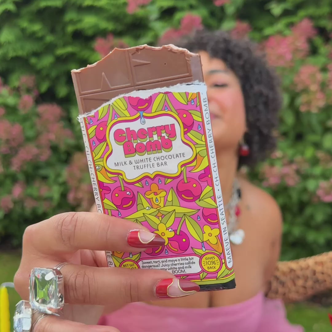 Video close up showing Colorful packaging on Cherry chocolate bar by Maeve Chocolate